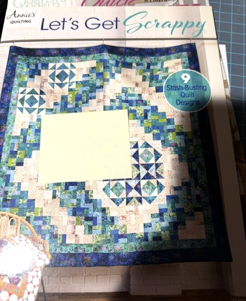 Annie's Quilting Let's Get Scrappy book cover featuring quilt on chair